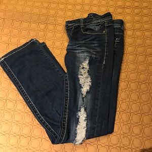 Dark blue boot cut ripped jeans